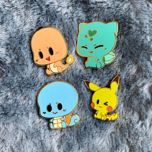 Gotta get them all! Pokemon generation 1 starters: Bulbasaur, Charmander, Pikachu and Squirtle chibi-style enamel pins, set of four pins